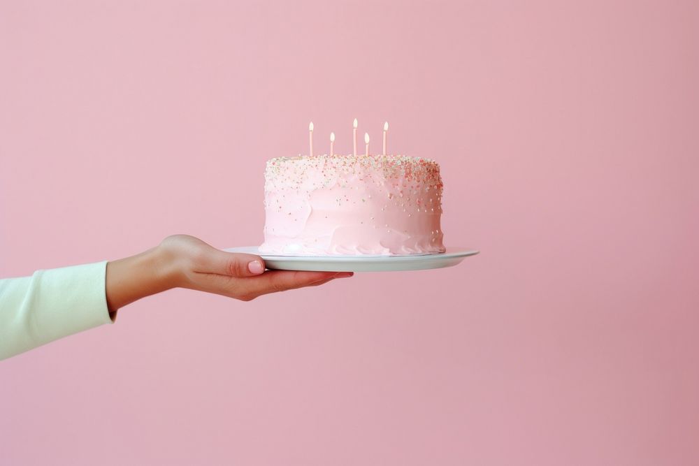 People hand holding minimal cute birthday cake dessert food anniversary. AI generated Image by rawpixel.