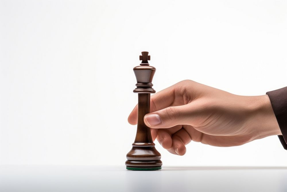Chess holding game hand. AI generated Image by rawpixel.
