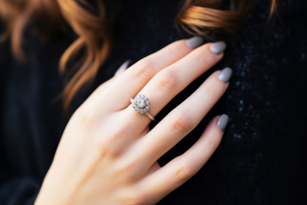 Diamond ring jewelry finger hand. AI generated Image by rawpixel.