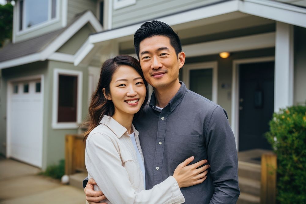 Asian couple standing adult house. 