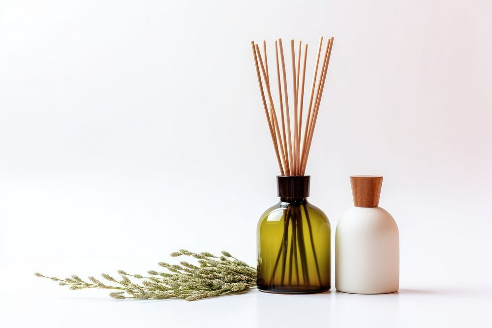Aromatherapy reed diffuser bottle white background container. AI generated Image by rawpixel.