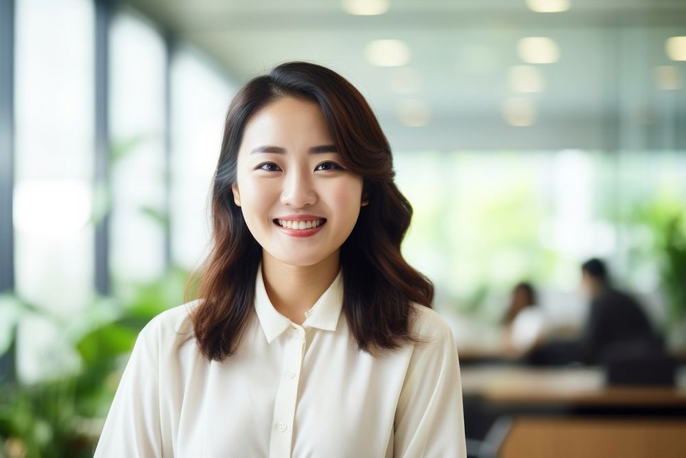 Happy asian woman portrait smiling office. AI generated Image by rawpixel.