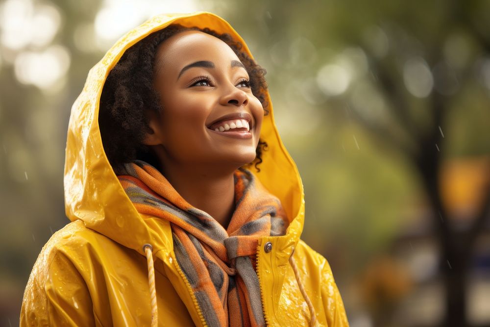 Young african woman raincoat smiling smile. AI generated Image by rawpixel.