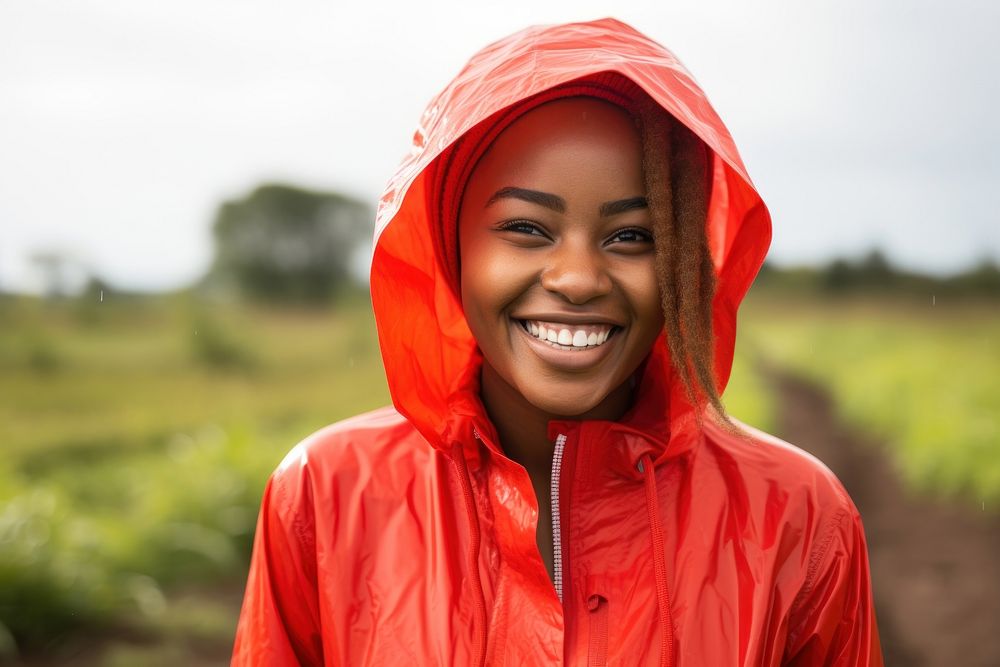 Young african woman raincoat smiling jacket. AI generated Image by rawpixel.