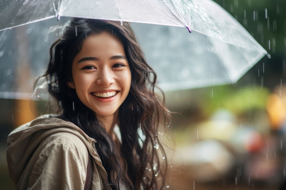 Young asian woman umbrella smiling smile. AI generated Image by rawpixel.