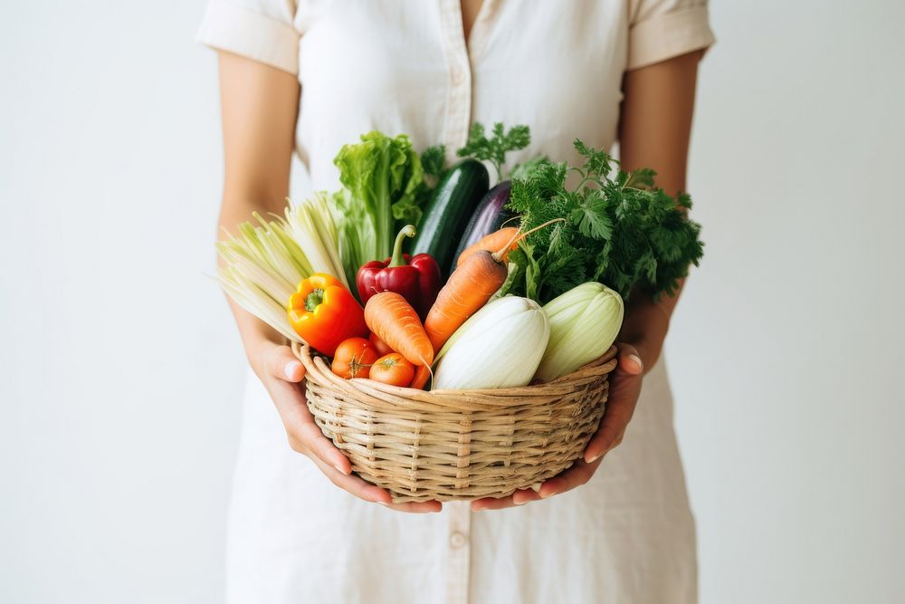 Woman holding beautiful vegetables basket adult woman food. AI generated Image by rawpixel.