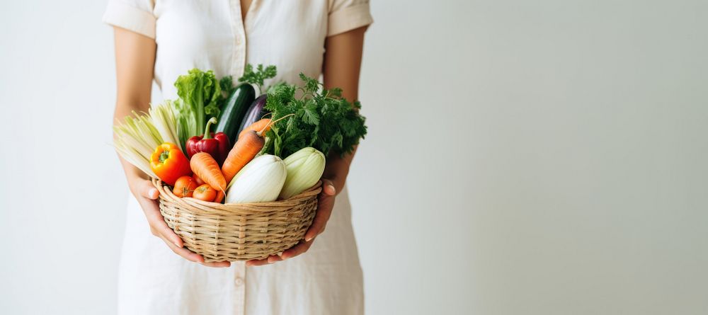 Woman holding beautiful vegetables basket adult woman food. AI generated Image by rawpixel.