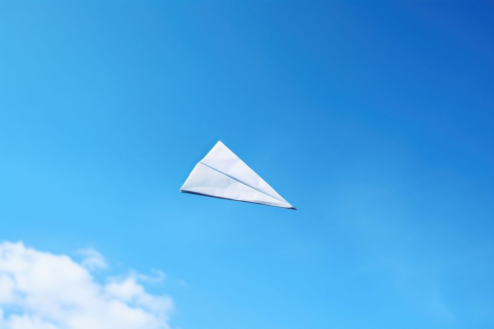 Paperplane paper blue sky. AI generated Image by rawpixel.