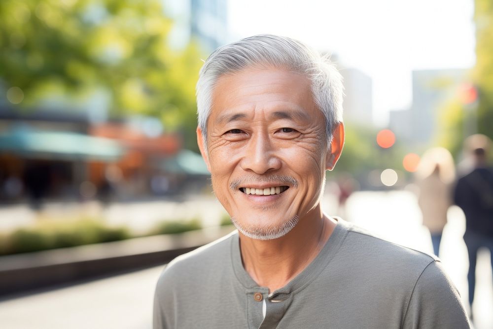 Senior man smiling Asian man portrait outdoors. AI generated Image by rawpixel.