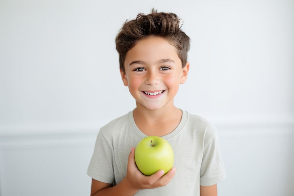 Green apple portrait smiling holding. AI generated Image by rawpixel.