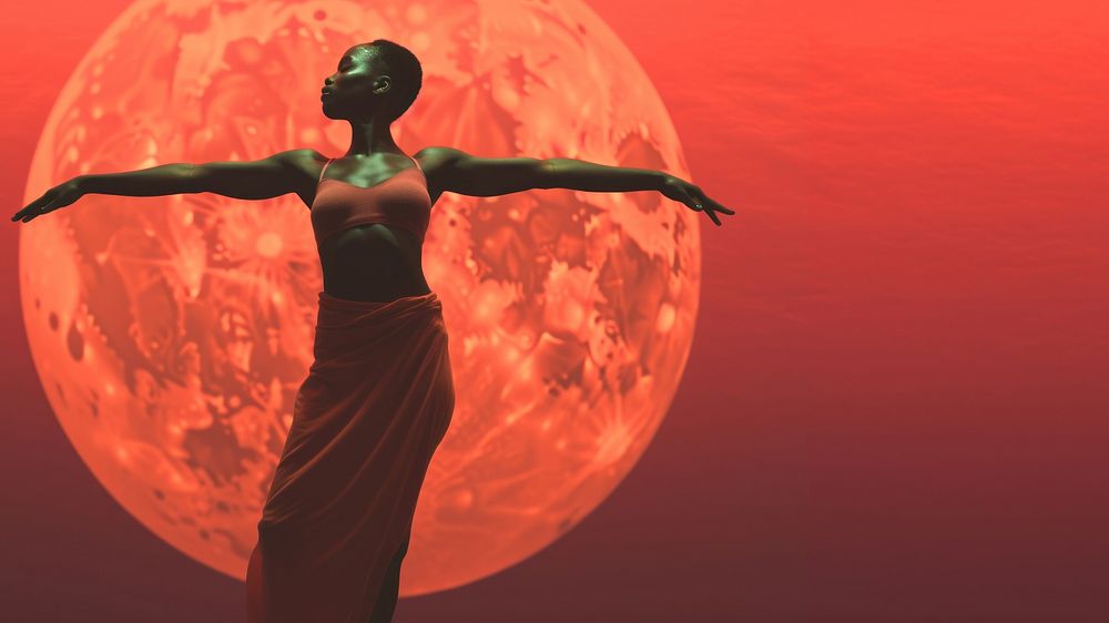 photo of an african american woman standing yoga pose.  