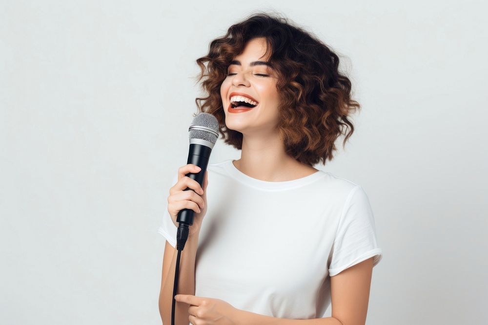 Singing microphone holding adult. AI generated Image by rawpixel.