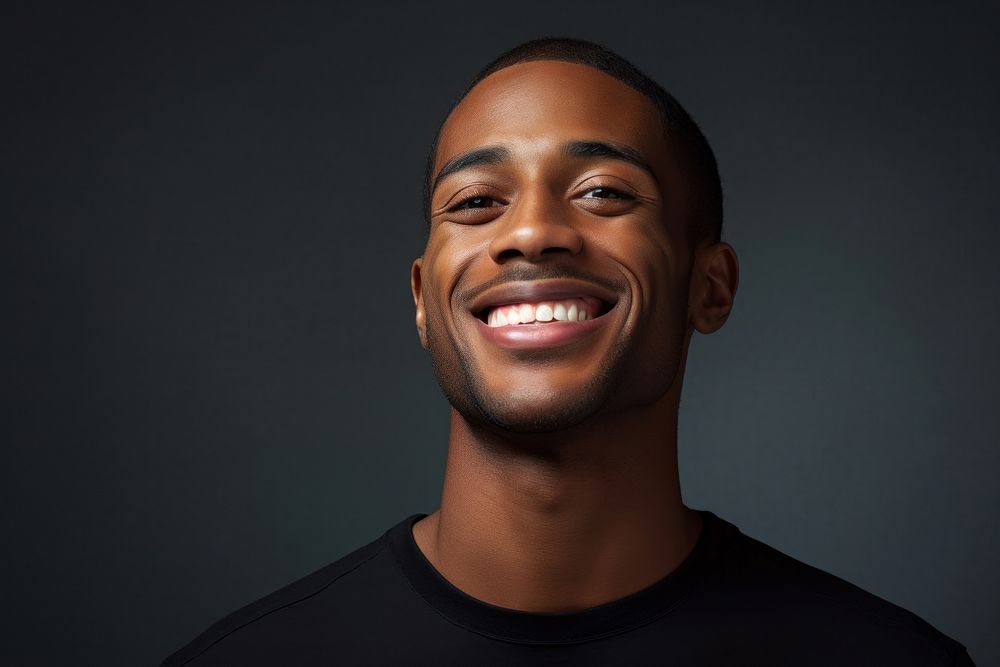 Black men smile portrait laughing. 