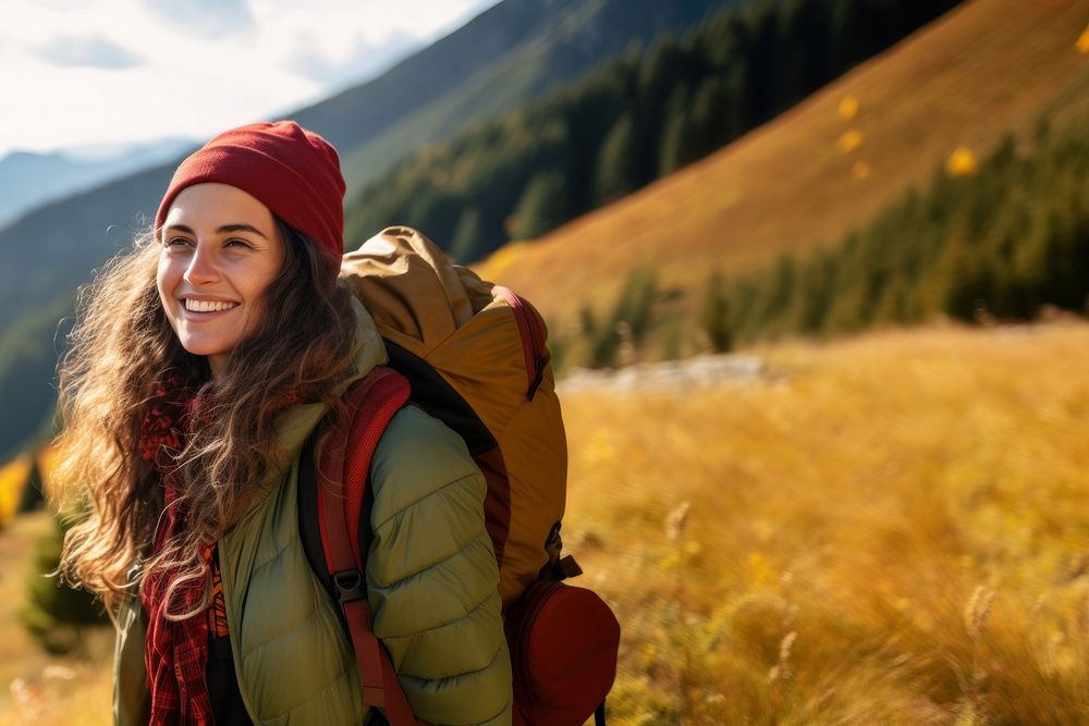 Photo of happy smiling woman hiking in mountains. AI generated Image by rawpixel. 