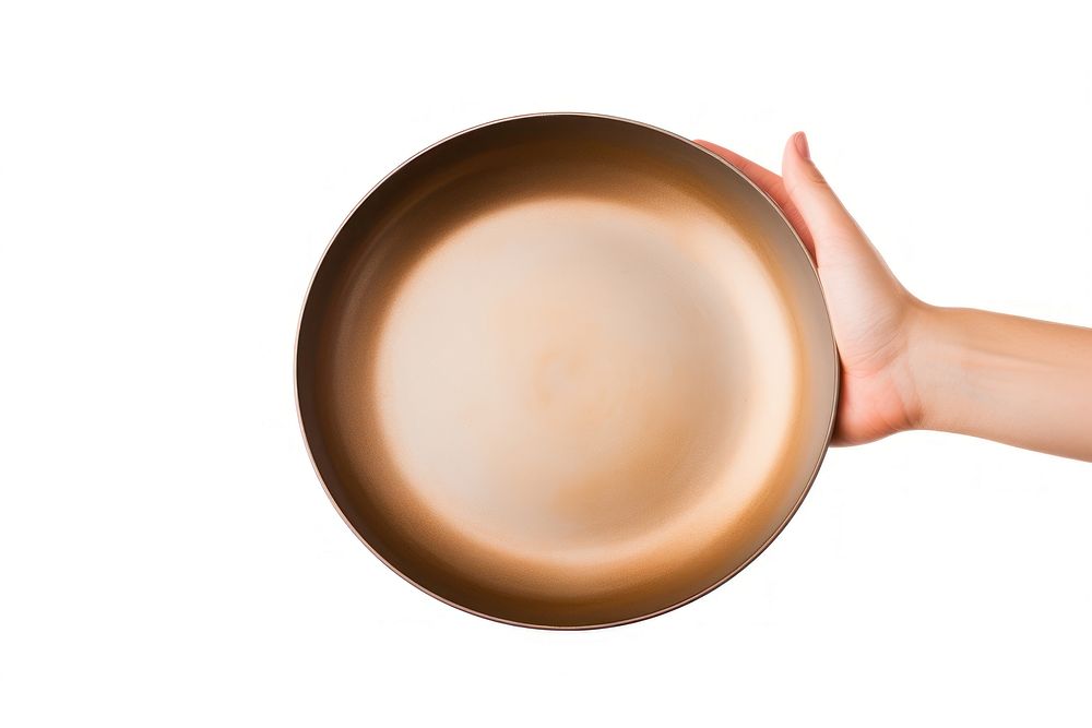 Hand holding pan white background dishware cookware. AI generated Image by rawpixel.