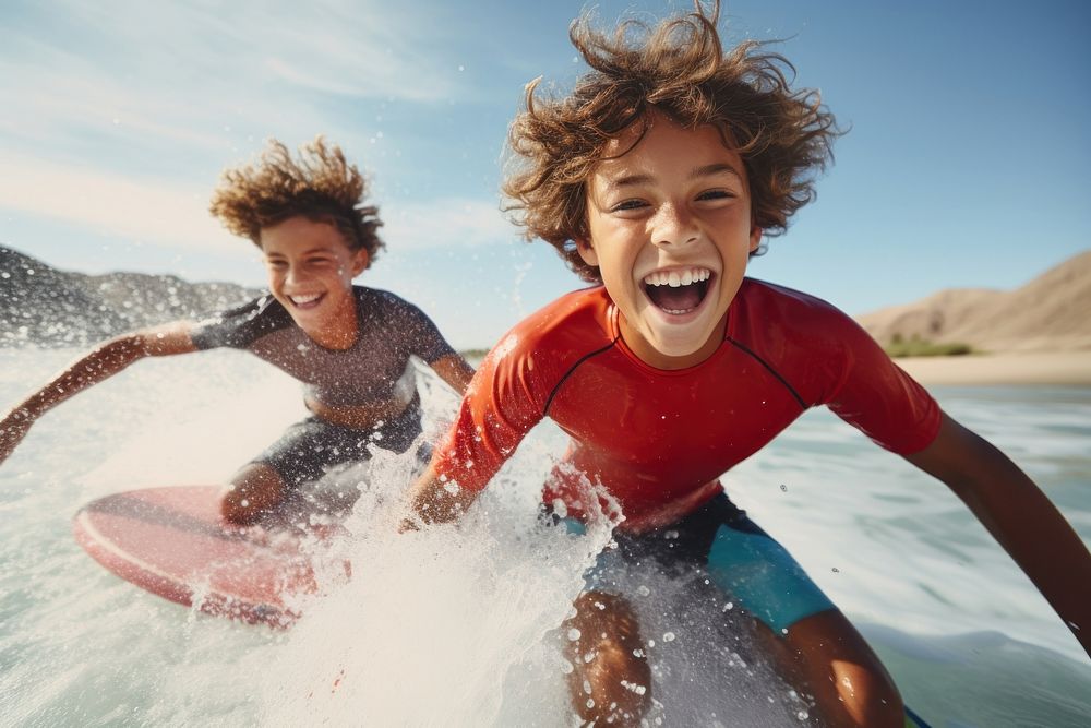 Two diversity cool kids surfing recreation laughing outdoors. AI generated Image by rawpixel.