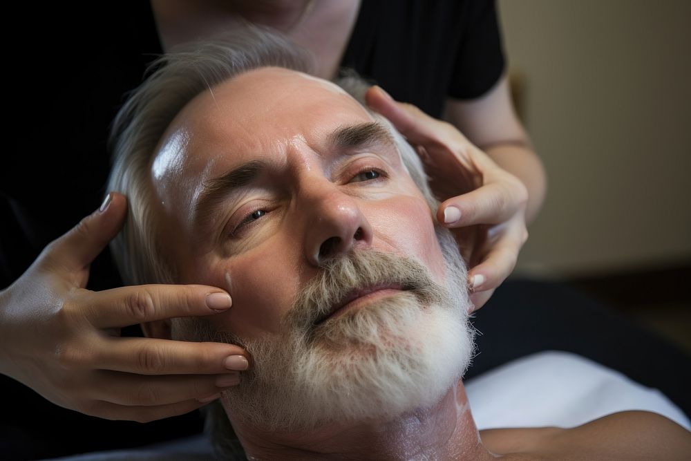 Man having spa adult relaxation headshot. 