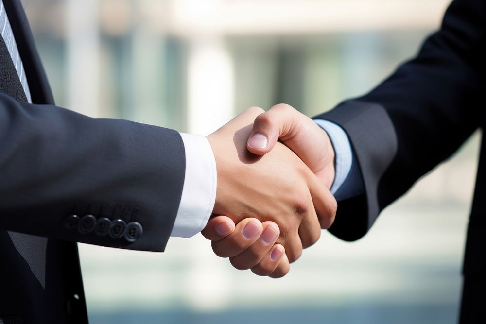 Businessman handshake agreement greeting success. AI generated Image by rawpixel.