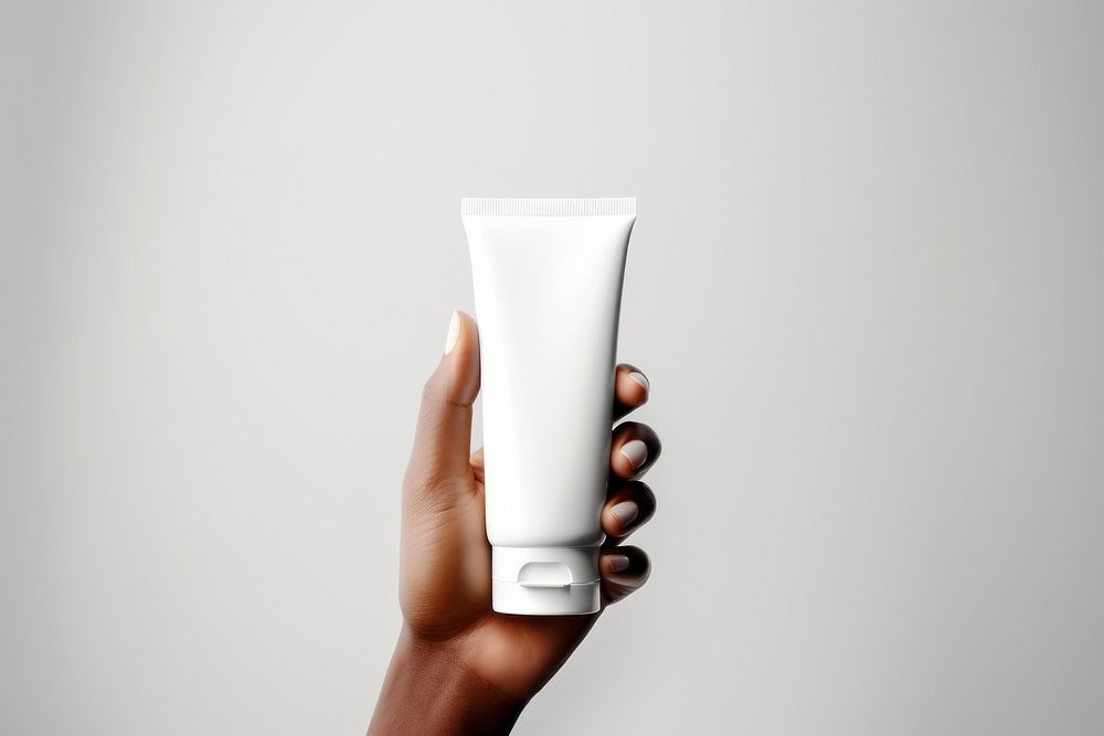 Mockup White face cream Hand cosmetics. AI generated Image by rawpixel.