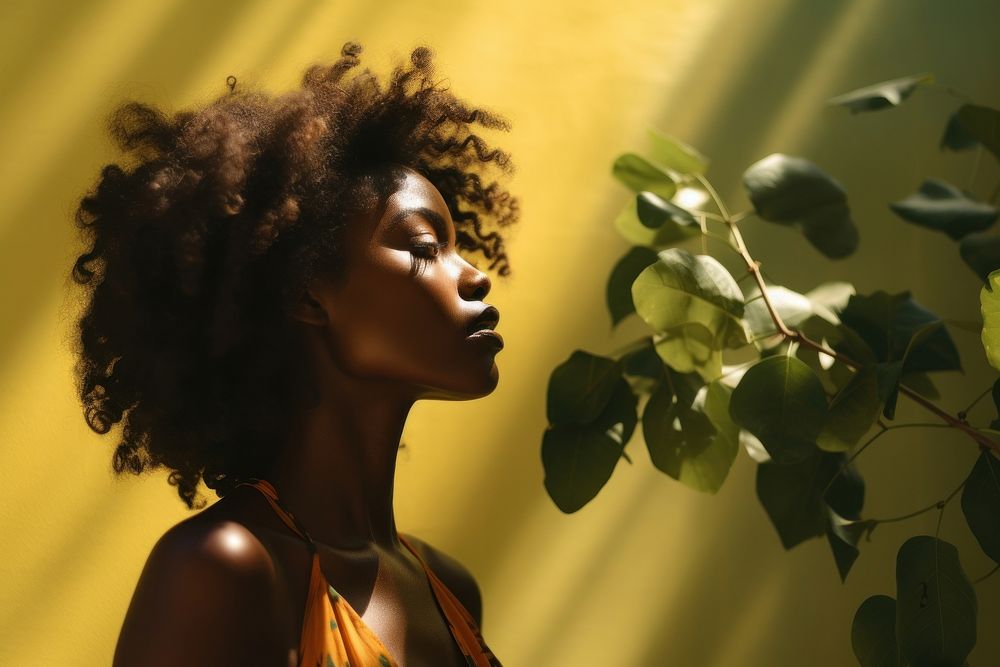 A dark-skinned woman portrait adult plant. AI generated Image by rawpixel.