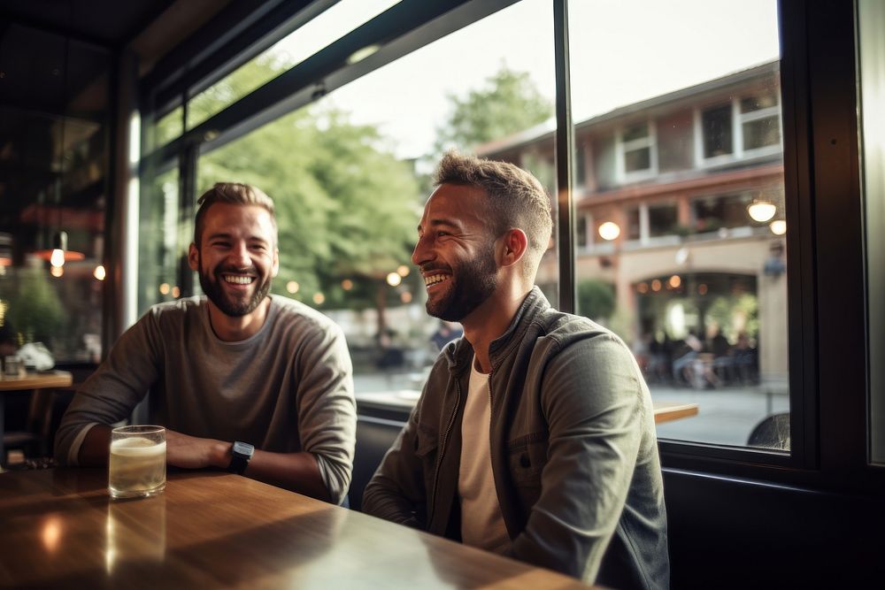 Gay couple photography restaurant laughing. 