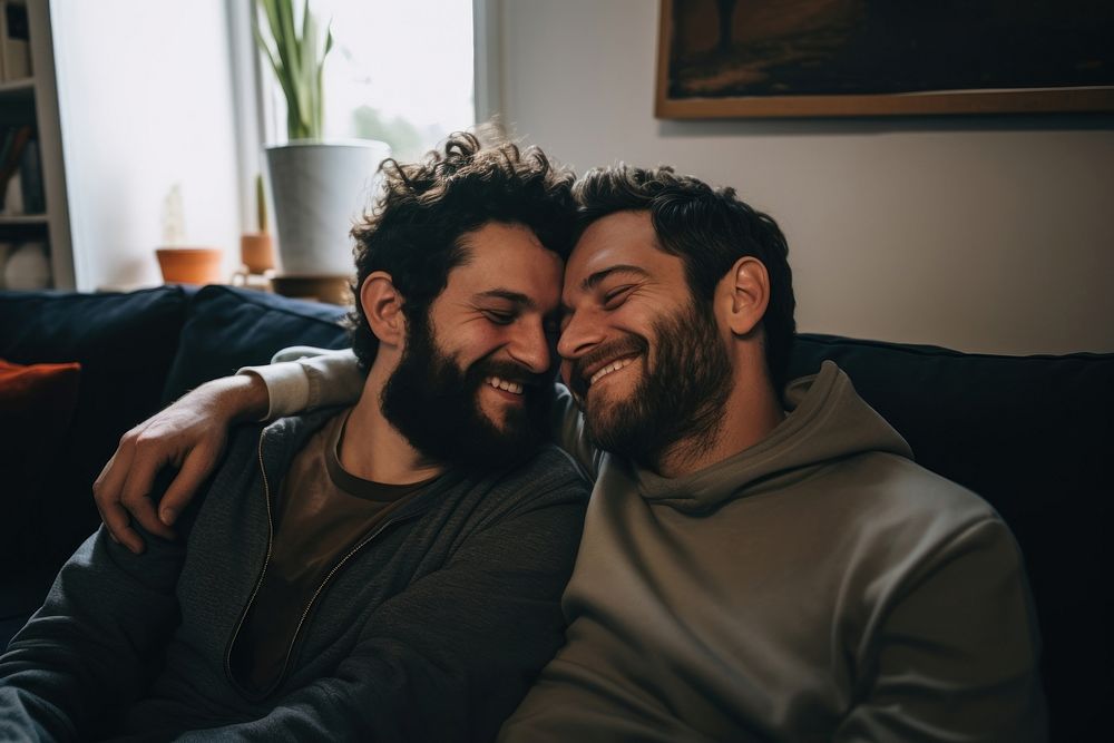 Gay couple smiling adult sofa. AI generated Image by rawpixel.