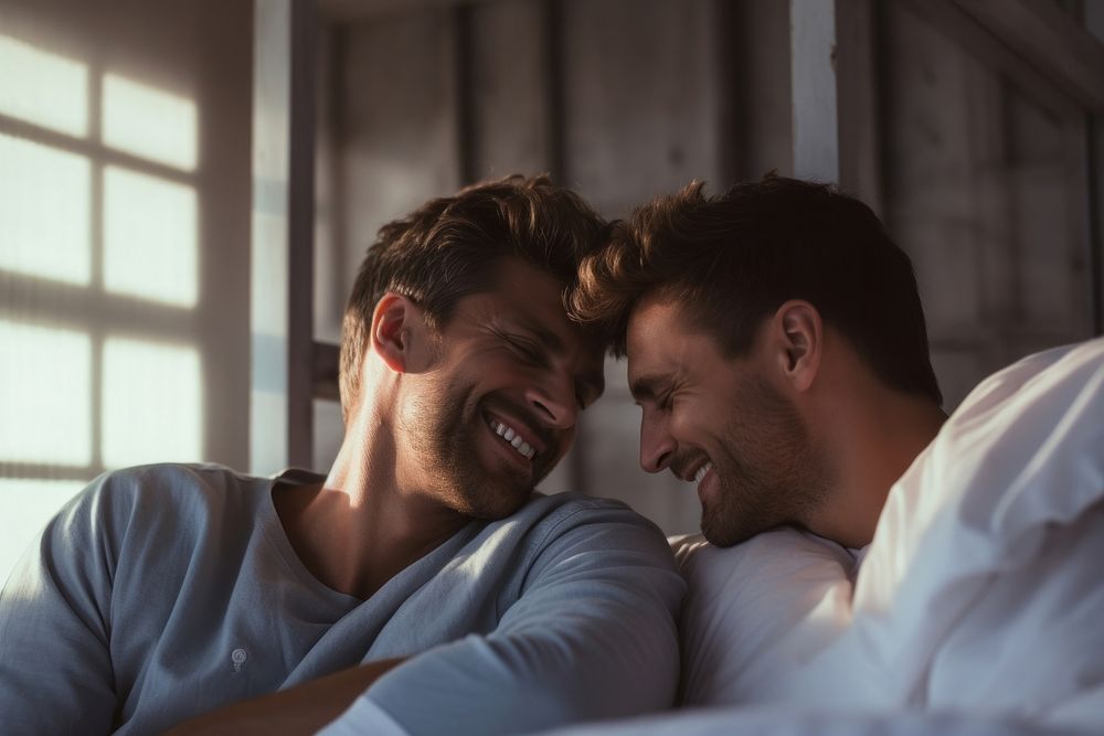 Gay couple smiling adult bed. AI generated Image by rawpixel.