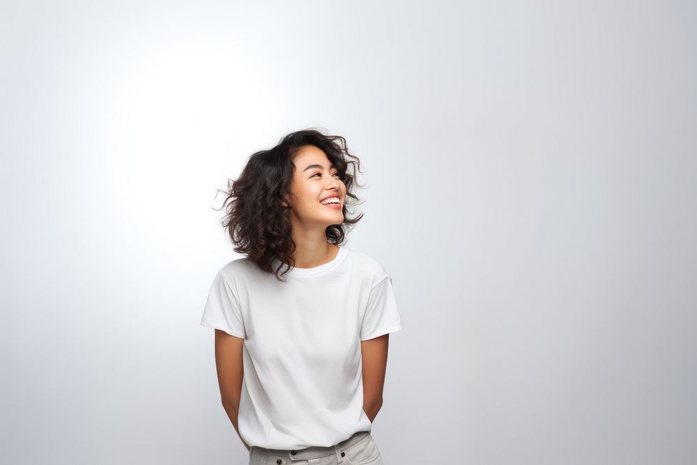 Woman white t-shirt laughing smiling. AI generated Image by rawpixel.