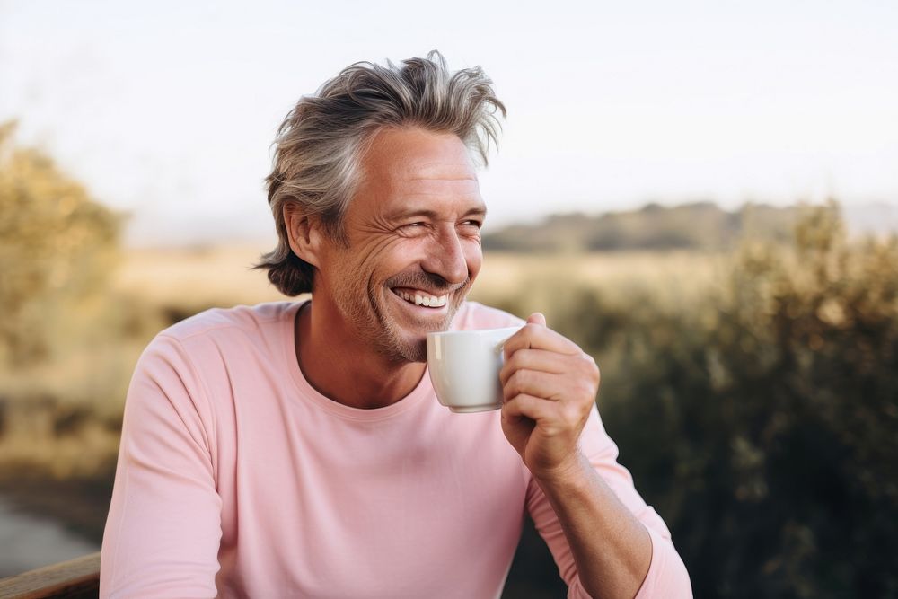 Man drinking tea smiling smile mug. AI generated Image by rawpixel.