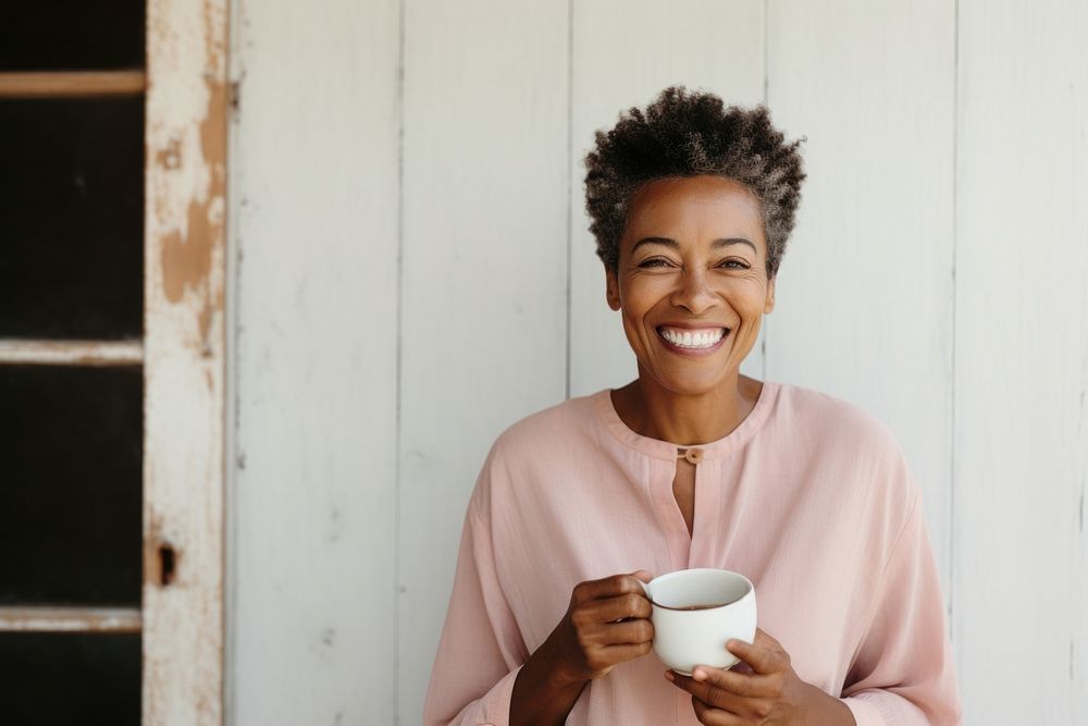 Woman drinking tea smiling smile cup. 