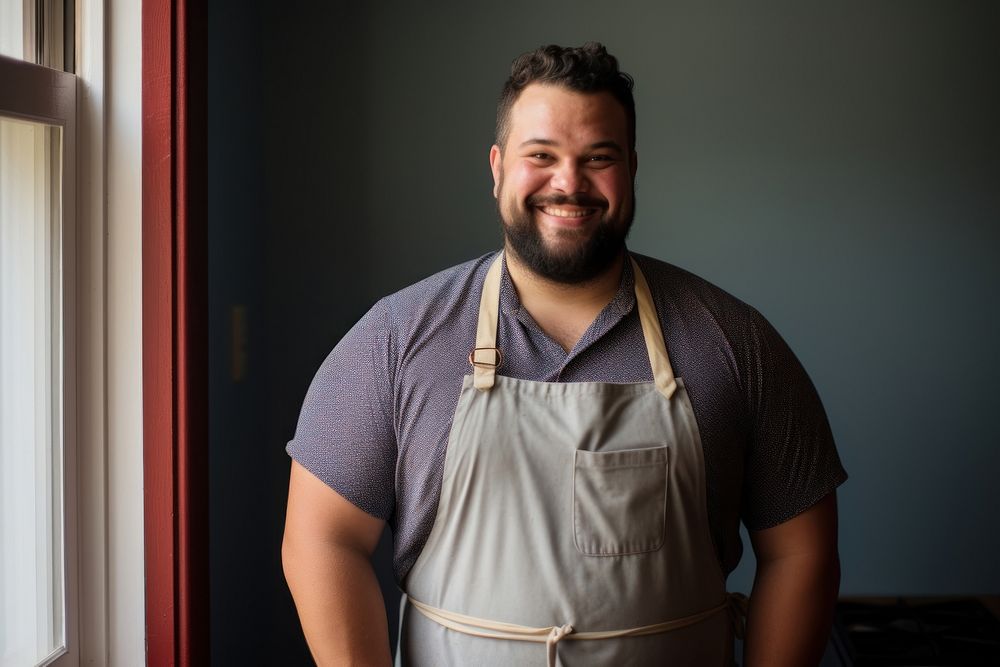 Apron smiling adult man. 