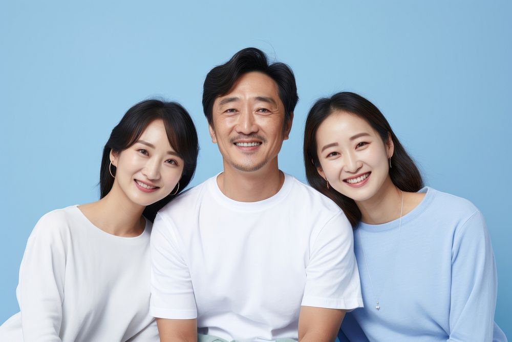 Asian family smiling adult smile. AI generated Image by rawpixel.