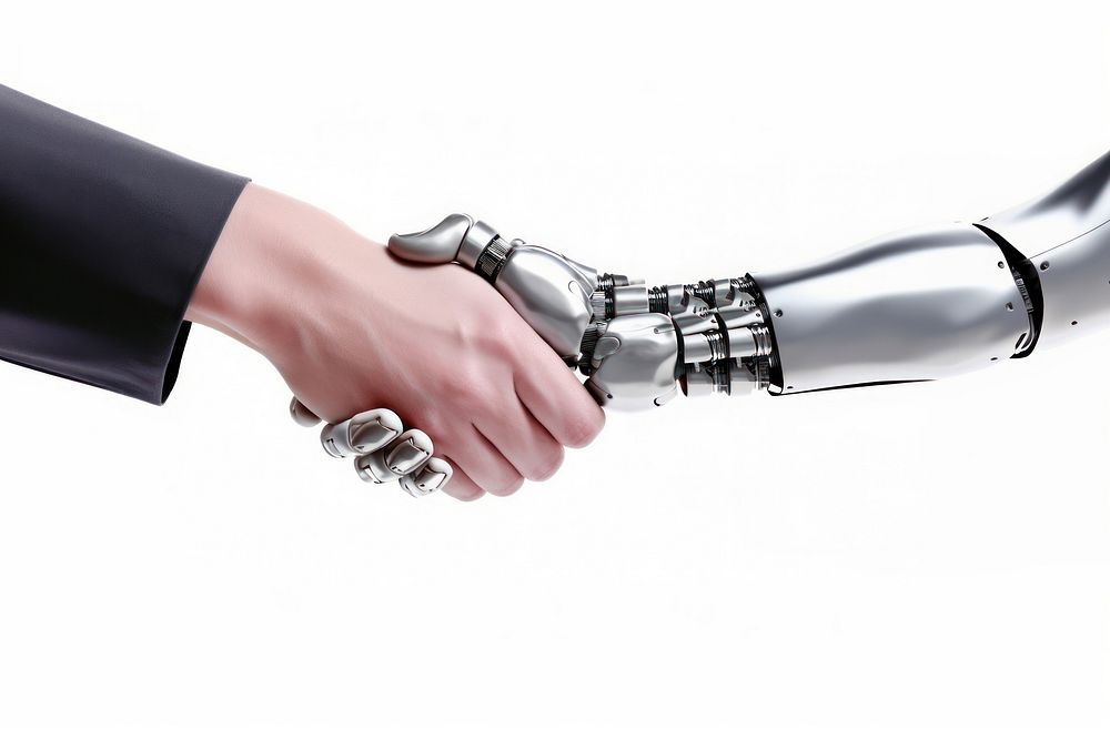 A metallic robotic hand shaking hand with human hand technology medication agreement.