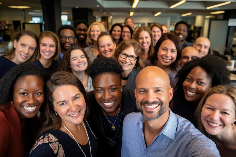 Multiple race employees laughing adult smile. 