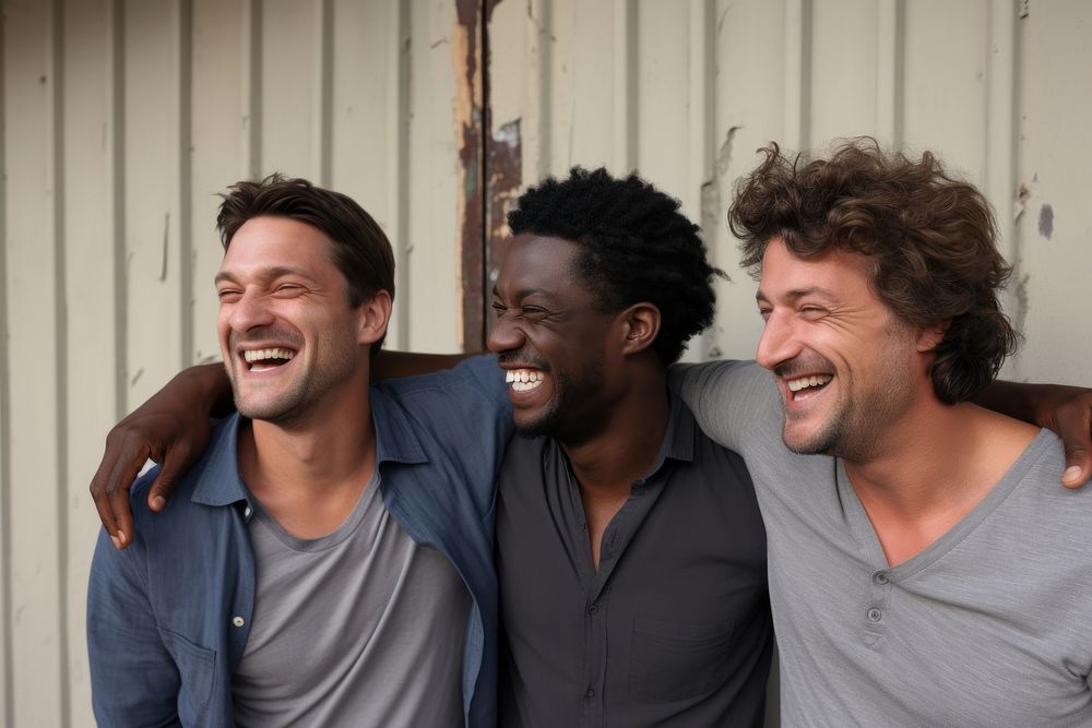 Different race men laughing adult togetherness. 