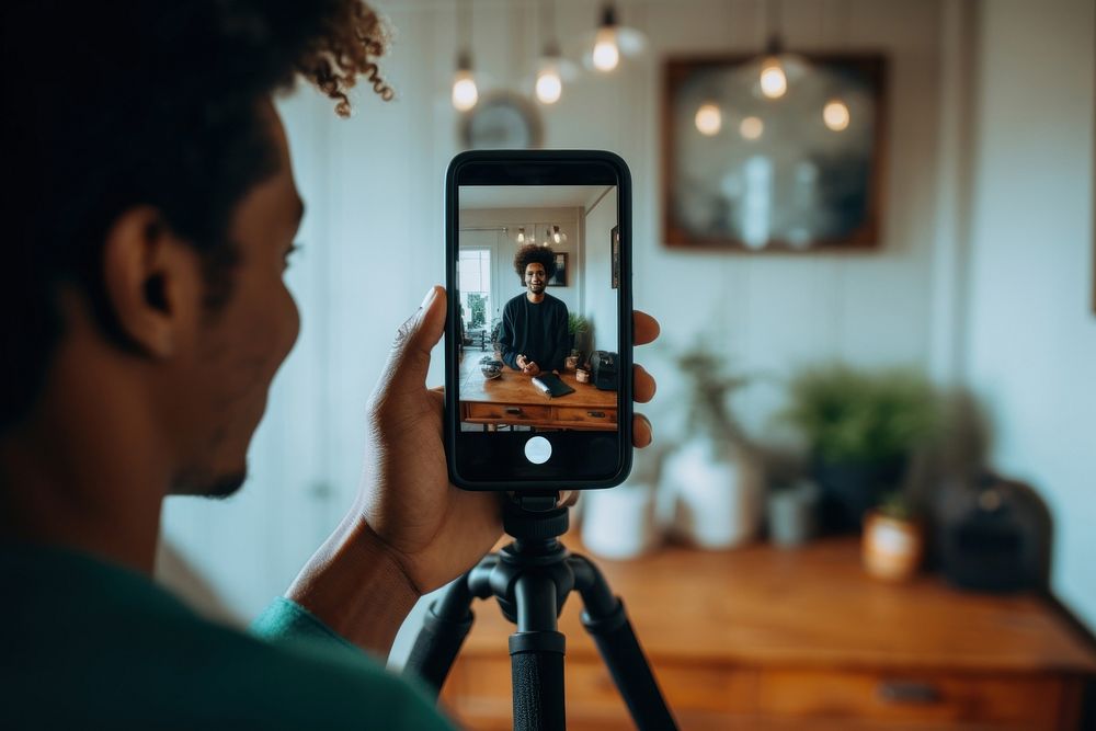 Influencer filming person photo. AI generated Image by rawpixel.