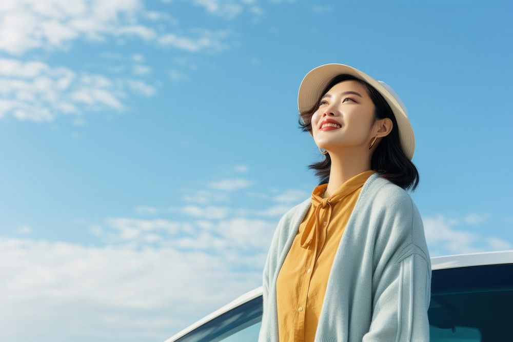 Female adult car sky. 