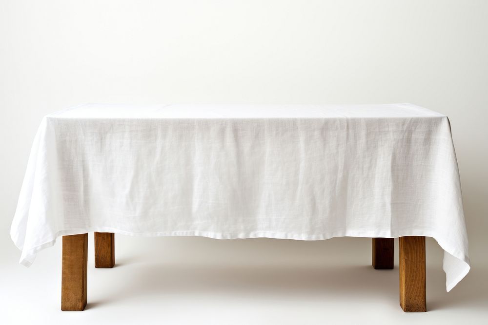 White linen table cloth linens tablecloth furniture. AI generated Image by rawpixel.