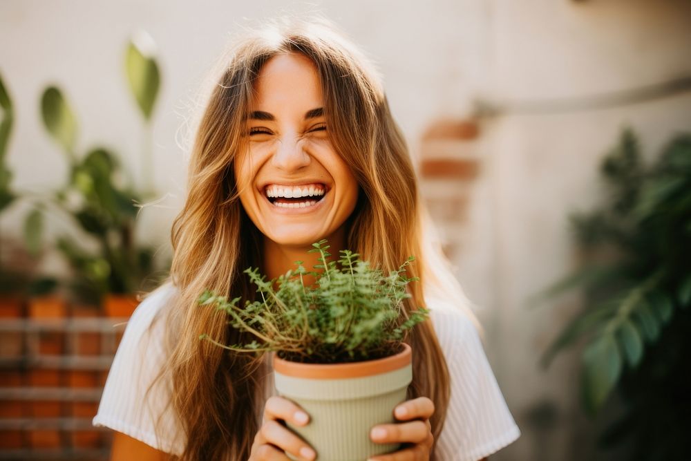 Happy woman with potted plant. AI generated Image by rawpixel.