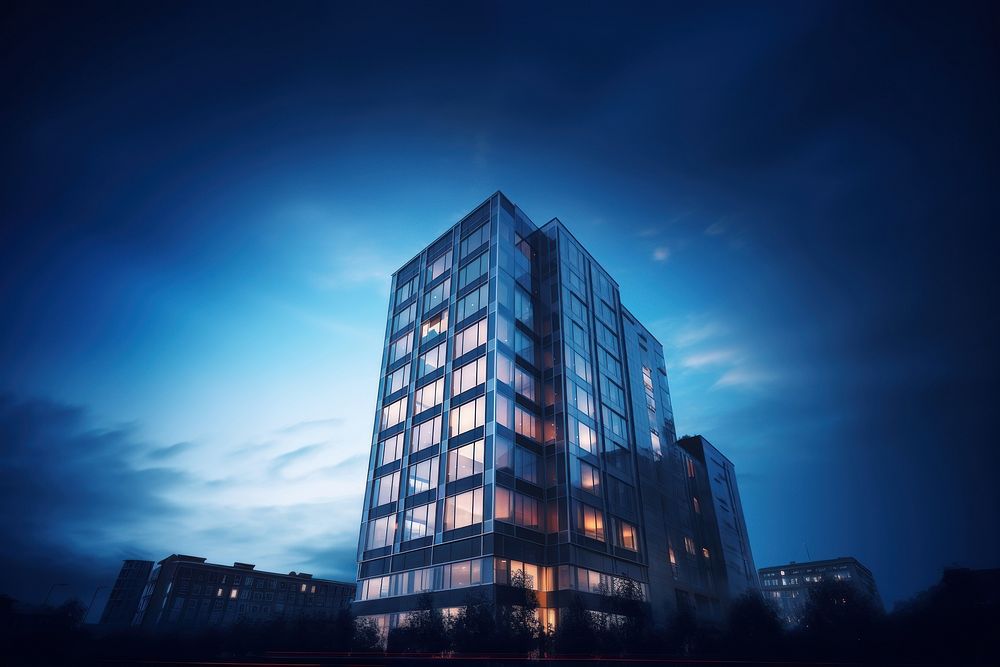 Apartment building at night. AI generated Image by rawpixel.