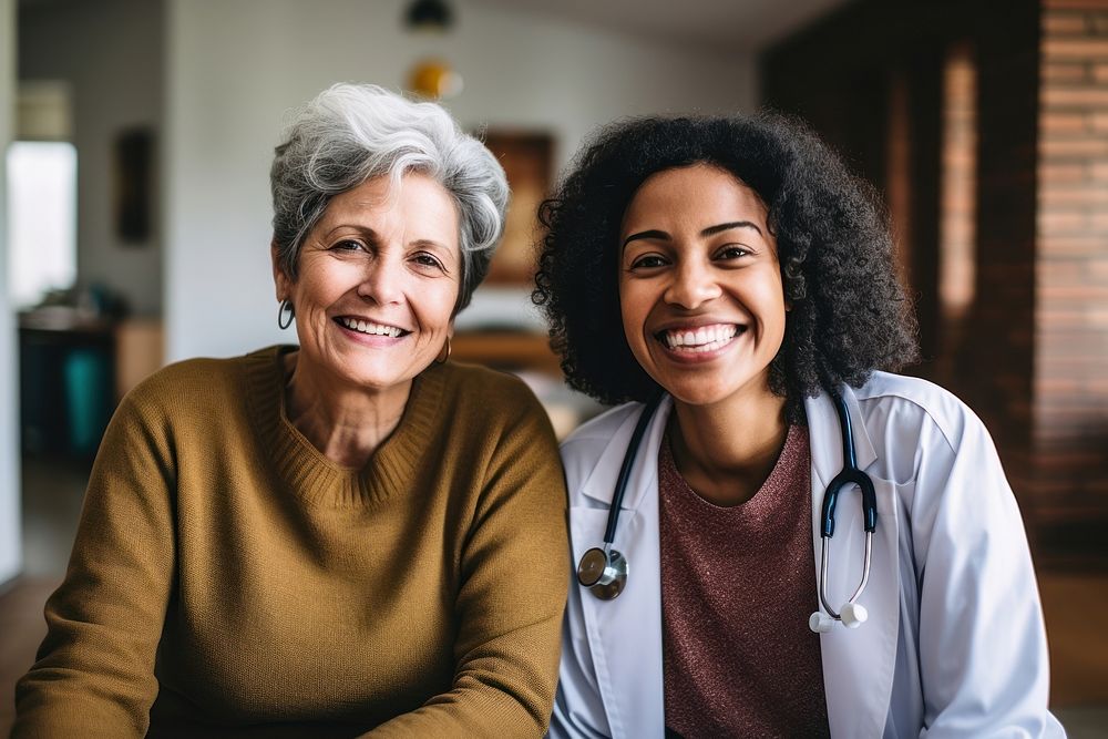 Old woman consulting a woman doctor adult togetherness stethoscope. AI generated Image by rawpixel.
