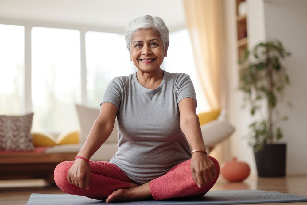 Senior indian woman exercise sitting sports adult. AI generated Image by rawpixel.