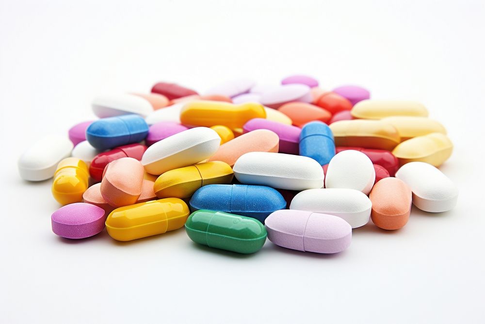 Pills white background confectionery medication. AI generated Image by rawpixel.