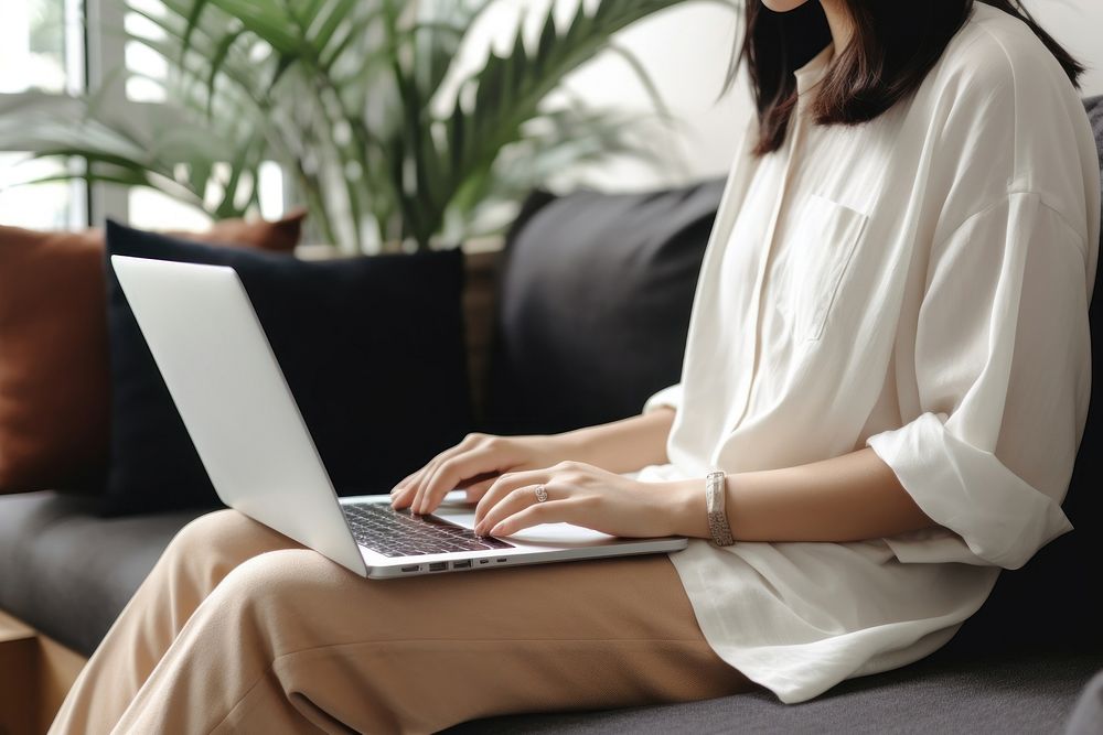 Sitting laptop furniture computer. 