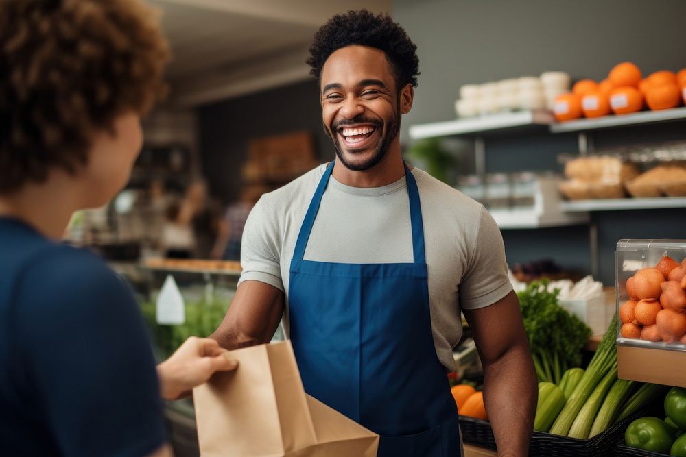 Groceries customer checkout smiling. 