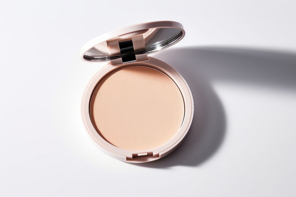Beauty compact makeup foundation cosmetics white background powder. AI generated Image by rawpixel.