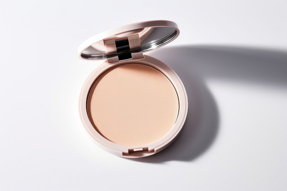 Beauty compact makeup foundation cosmetics white background powder. 