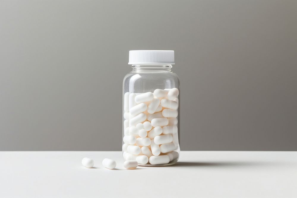 Hand holding pill bottle medical white jar. AI generated Image by rawpixel.