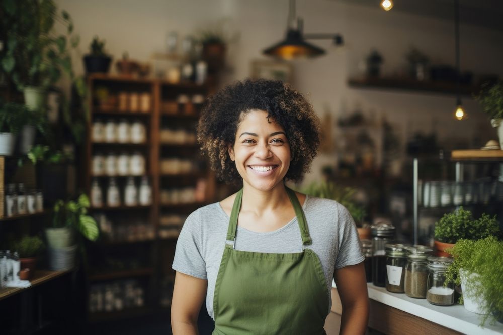 Standing smiling working adult. 