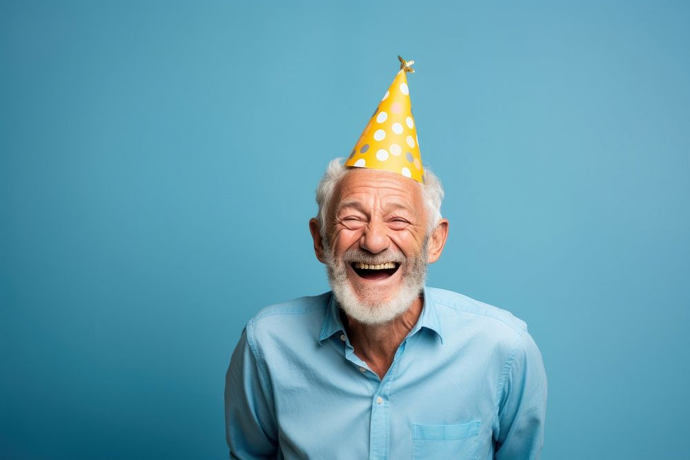 Man short hair wearing party hat laughing adult blue. AI generated Image by rawpixel.